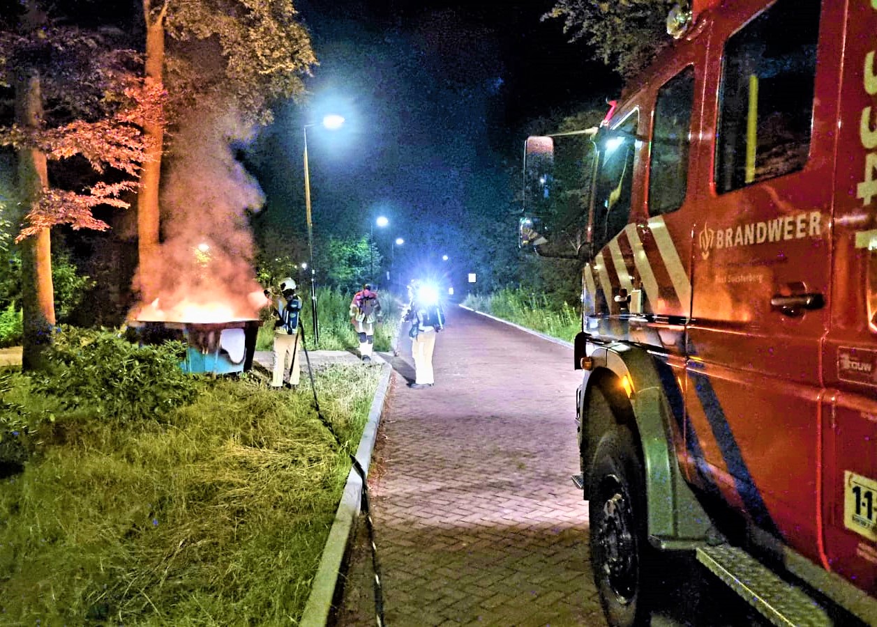 Inhoud bouwcontainer in brand